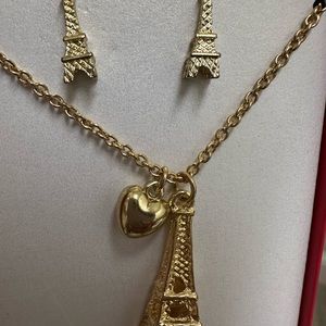 18’ necklace and earrings set. Eiffel Tower design in gold color.